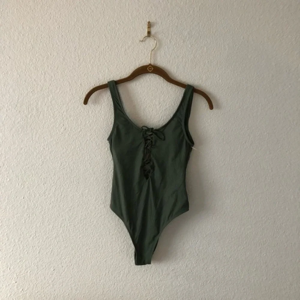 Xhiliration Green Ribbed Plunge One Piece NWOT